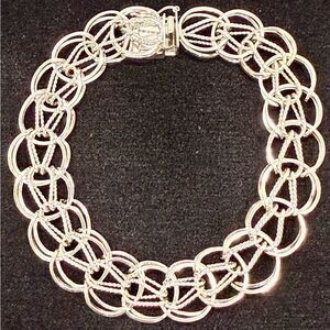 Elegant Sterling Silver Vintage Charm Bracelet